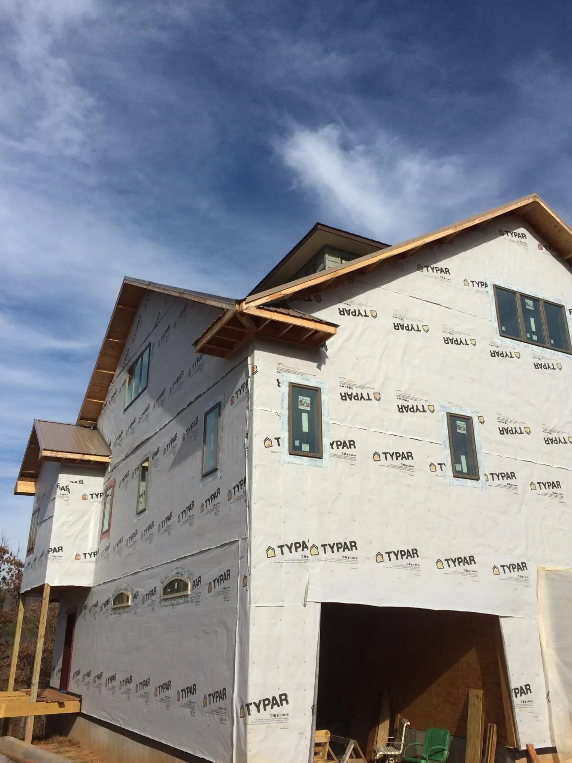 Stick built house wrapped in Typar with new roof framing and dormers in Dietrich